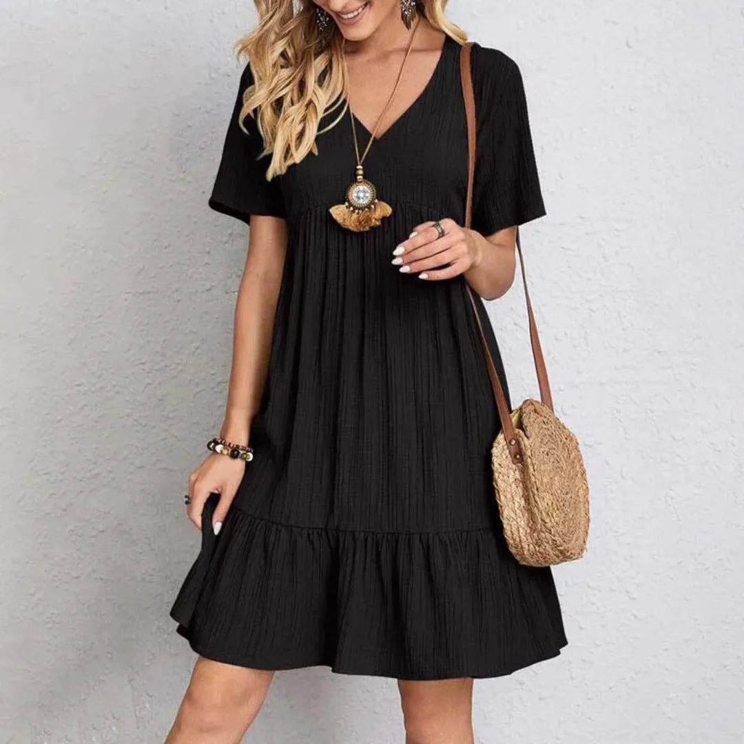 Sabine Riviera Kleid – V-Ausschnitt &amp; verspielt