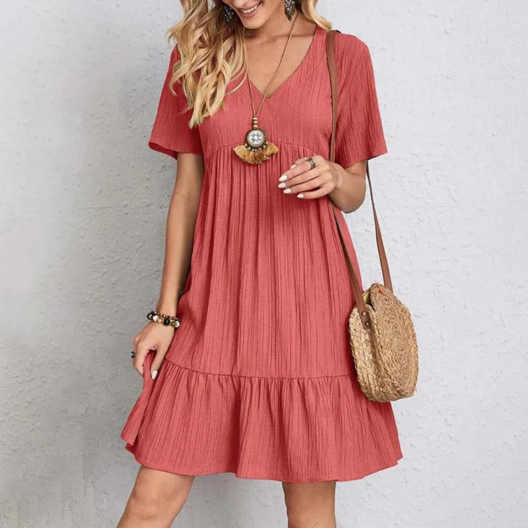 Sabine Riviera Kleid – V-Ausschnitt &amp; verspielt