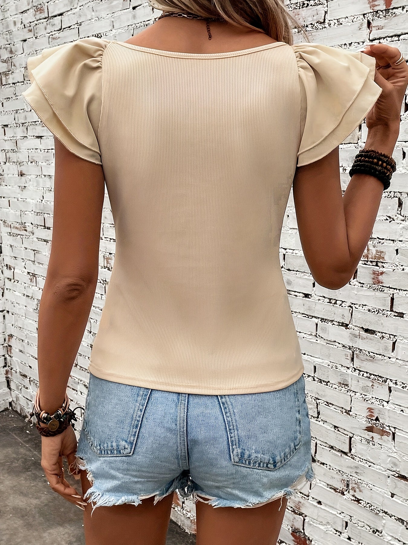 Sofia Solé Top – playful sleeve layer &amp; soft stretch